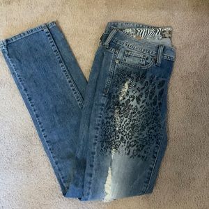 Guess ripped studded cheetah print skinny jeans. Size 27